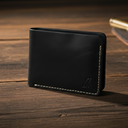Black leather bifold wallet with rugged texture