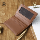 Beige slim wallet with embossed monogram pattern