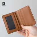 Beige slim wallet with embossed monogram pattern