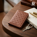 Beige slim wallet with embossed monogram pattern