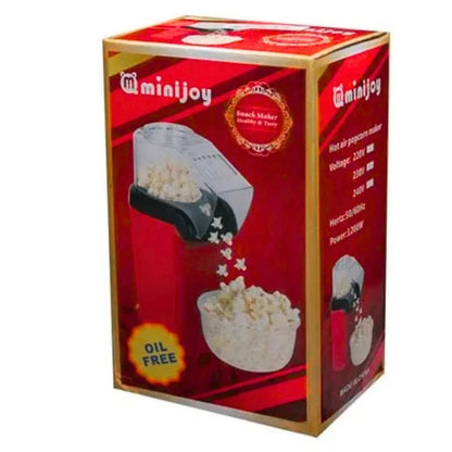 Electric hot air popcorn maker with measuring cup