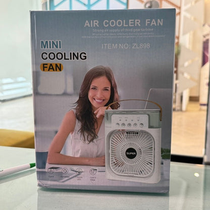 Package of a mini cooling fan with a woman on the cover