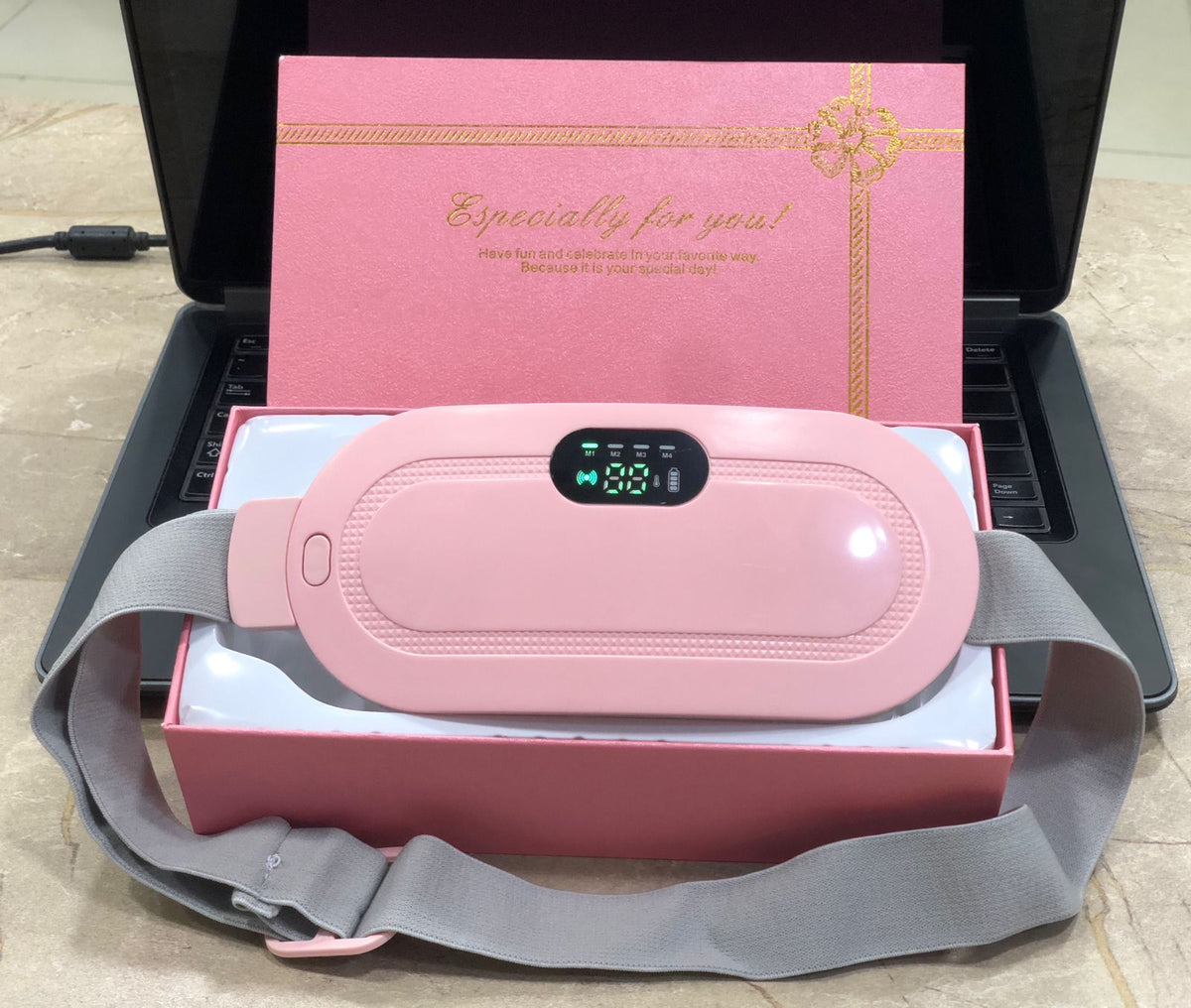 Portable heated waist belt with adjustable comfort settings