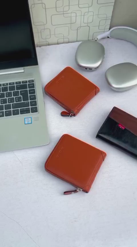Compact wallet with three cash compartments