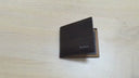 Brown men's wallet with spacious cash compartment