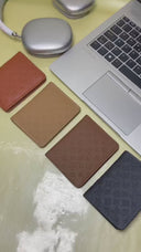 Beige slim wallet with embossed monogram pattern
